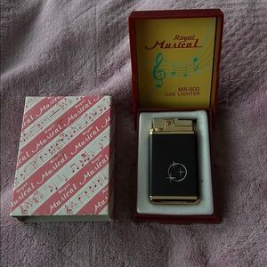 Vintage Royal Musical Black and Gold MR-500 Gas Lighter